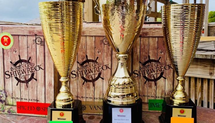 Sunshine accepts Rum Punch Trophy (3)