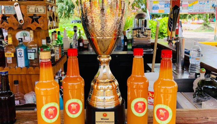 Sunshine accepts Rum Punch Trophy (7)