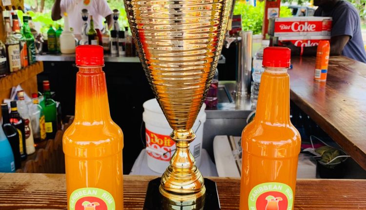 Sunshine accepts Rum Punch Trophy (8)