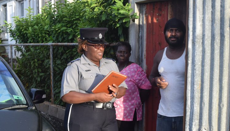 Sgt Henry informing Lozack Road Resident of parking restrictions during CPL