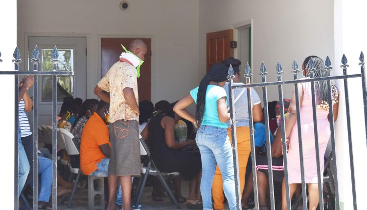 A subset of persons waiting to have an audience with Prime Minister Harris at the Constituency office in Tabernacle on Saturday July 18.