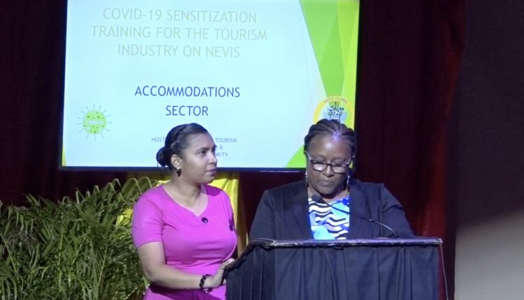 (L-r)Assistant Nurse Manager Chandreka Wallace; and Assistant Matron Jessica Scarborough from the Alexandra Hospital making a presentation on “Health and Safety Protocols” at the first COVID-19 sensitization training session, hosted by the Ministry of Tourism in collaboration with the Nevis Tourism Authority and the Ministry of Health, on July 27, 2020 at the Nevis Performing Arts Centre