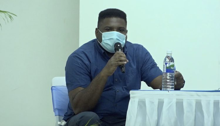 Hon. Troy Liburd, Junior Minister of Education in the Nevis Island Administration (NIA), making a presentation during an NIA town hall meeting at the Cotton Ground Community Centre, on July 23, 2020