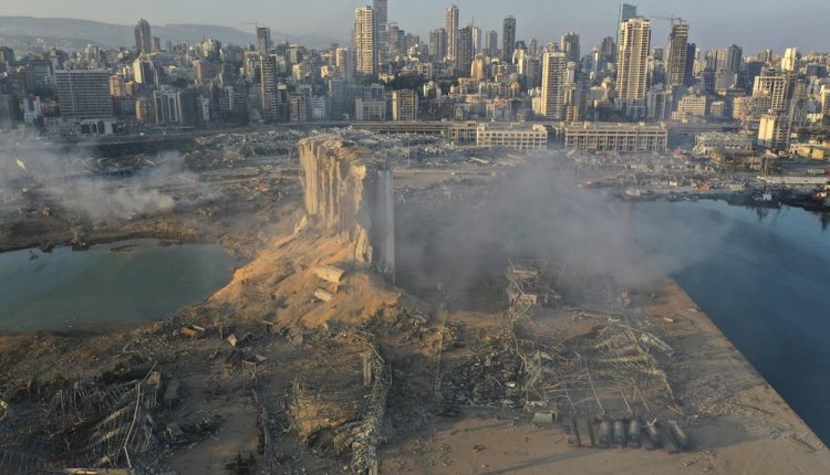 A drone picture shows the scene of an explosion at the seaport of Beirut, Lebanon, Wednesday, Aug. 5, 2020. A massive explosion rocked Beirut on Tuesday, flattening much of the city’s port, damaging buildings across the capital and sending a giant mushroom cloud into the sky. More than 70 people were killed and 3,000 injured, with bodies buried in the rubble, officials said. (AP Photo/Hussein Malla)