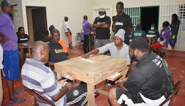 Captain of Unstoppable Domino Club, Samuel Wilson, in action when his team met and beat Guinness Domino Club 13-7 at the Edgar Gilbert Sporting Complex pavilion.