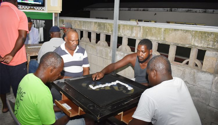 In the battle of former champions, Jermaine James of Lodge Domino Club takes no chances as his team beat Unity Patriots Domino Club 13-9 at Cuban Bar in Lodge Project.
