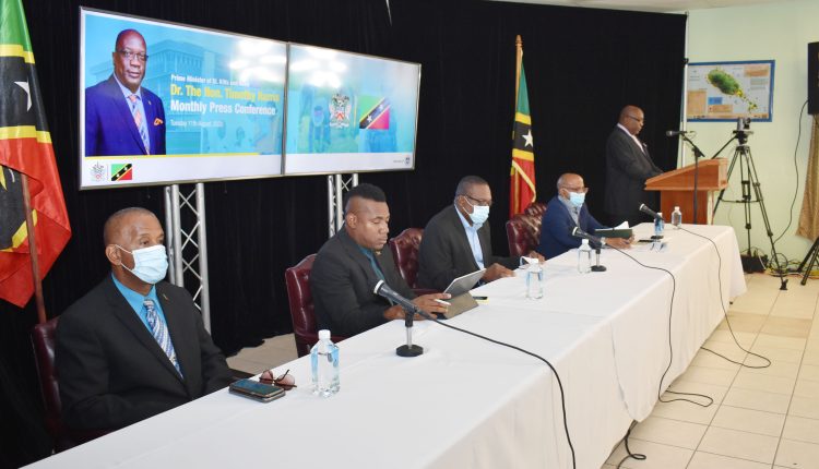 Supporting the Prime Minister at the head table From left are the Hon Eric Evelyn, the Hon Shawn Richards, the Hon Eugene Hamilton, and the Hon Lindsay Grant.