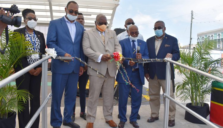 Cutting of the ribbon: from L-R are Ambassador His Excellency Ian Patches Liburd, the Hon Lindsay Grant, Prime Minister Dr the Hon Timothy Harris, the Hon Jonel Powell, and Ms Taffida Stewart.