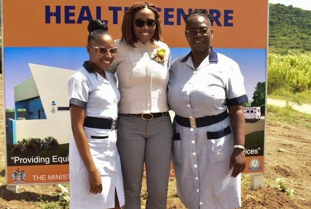 Minister of Health, the Hon. Akilah Byron-Nisbett poses with nurses at the site for the new St. Peter’s Health Center