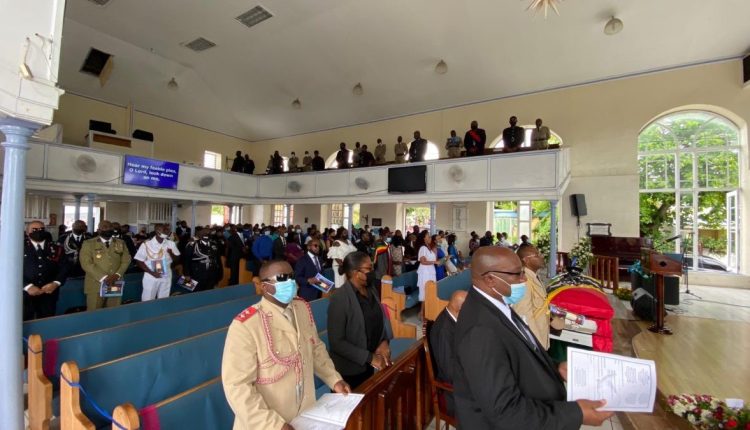Prime Minister Dr. the Hon. Timothy Harris and other dignitaries at the funeral service of the late Wayne Maccou.