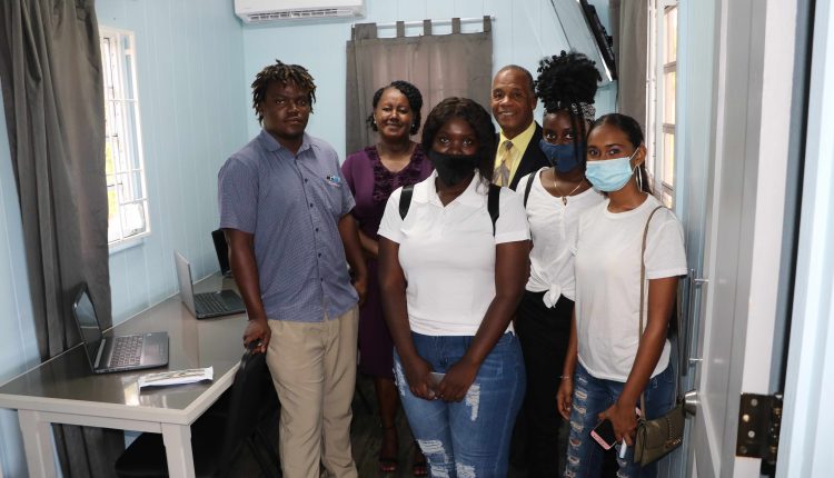 (back row l-r) Ms. Sandra Maynard, Director of the Department of Social Services on Nevis; and Hon. Eric Evelyn, Minister Social Development in the Nevis Island Administration; with programme participants at the October 27, 2020 opening of the “Yes To Success” skills training and diversion site at Pinney’s Estate, Nevis