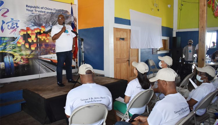 Prime Minister Harris addressing, at Ocean’s Bar in Frigate Bay, participants who had taken part in a clean-up on Frigate Bay and Friars Bay beaches on Saturday October 3.