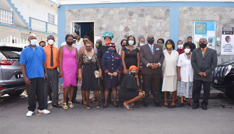 Prime Minister Dr the Hon Timothy Harris, and Deputy Speaker Senator the Hon Dr Bernicia Nisbett, pictured outside the church with members who had accompanied the Prime Minister to church.