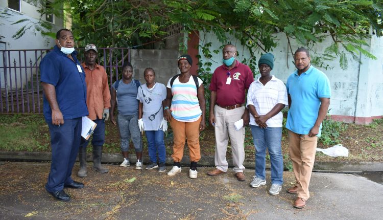 STEP Director Mr Emile Greene (left) with some members of the Needsmust/Conaree Community Enhancement Group. 2nd left is supervisor Mr Warren Benjamin, while Mr Jason McKoy is on the right and Mr William Phillip is 3rd right.