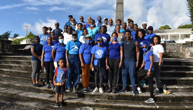 World Diabetes Day Grand Walk participants including Minister of Health the Hon Akilah Byron-Nisbett assemble at the Cenotaph after the gruelling walk,