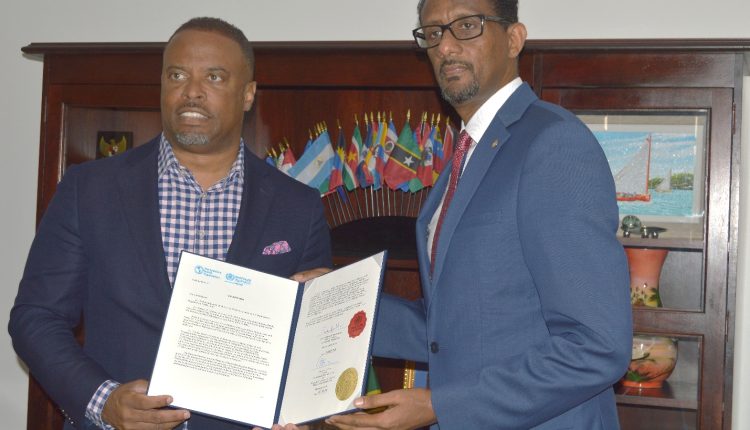 Dr. Yitades Gebre (right), representative of the Pan American Health Organization/World Health Organization to Barbados and Eastern Caribbean when he presented his credentials to the Hon. Mark Brantley, Premier of Nevis and Minister of Foreign Affairs (left) in Basseterre in February 2020