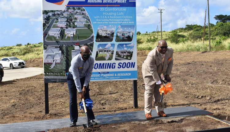 Prime Minister Dr the Hon Timothy Harris (right) and TDC Chairman and CEO Mr Earle Kelly turn the sod to break ground for ‘The Residence at Dewars’.