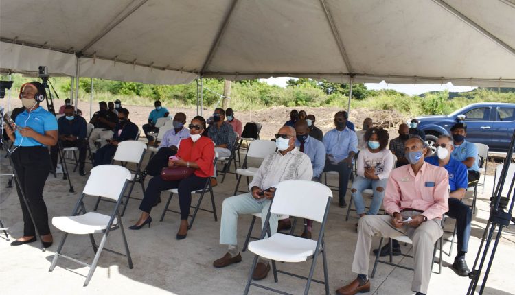 A cross-section of persons at the official ground breaking ceremony for ‘The Residence at Dewars’, who included Governor General’s Deputy Mr Michael Morton (2nd right front row).