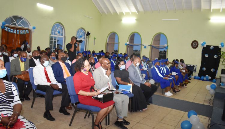 A cross-section of dignitaries, parents, and graduates at the graduation ceremony held at the Bethel Moravian Church in Parsons Ground.
