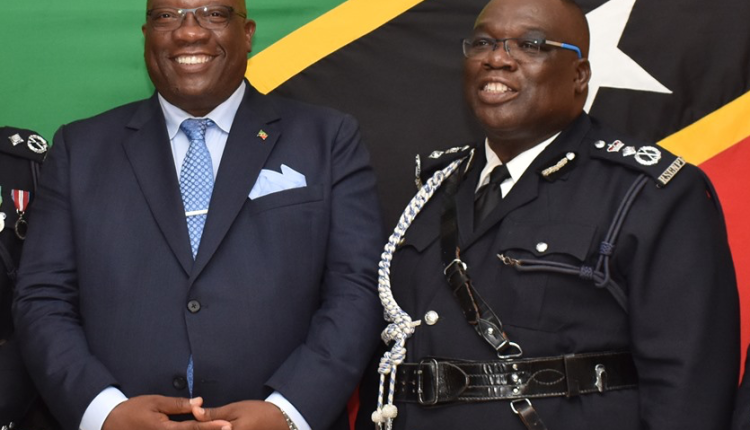 Prime Minister and Minister of National Security, Dr. the Hon. Timothy Harris pictured with Commissioner of Police, Mr. Hilroy Brandy