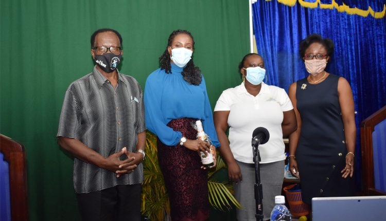 Posing for a picture after the Covid-19 vaccination information session, from left to right: Rev Dr Ben Browne, Dr General Surgeon Dr Natalie Osborne, Ms Jamillah Bristol, and Mrs Rosel Pemberton.