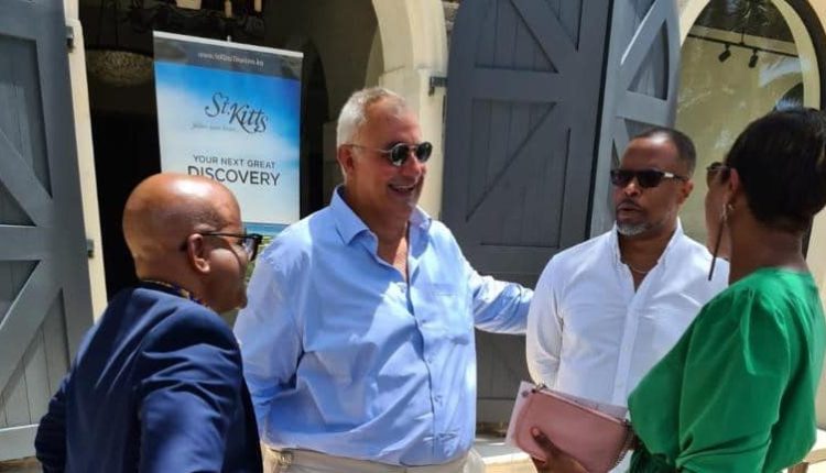 Premier Mark Brantley introducing St. Kitts and Nevis Government Ministers to film producer Mr. Philippe Martinez