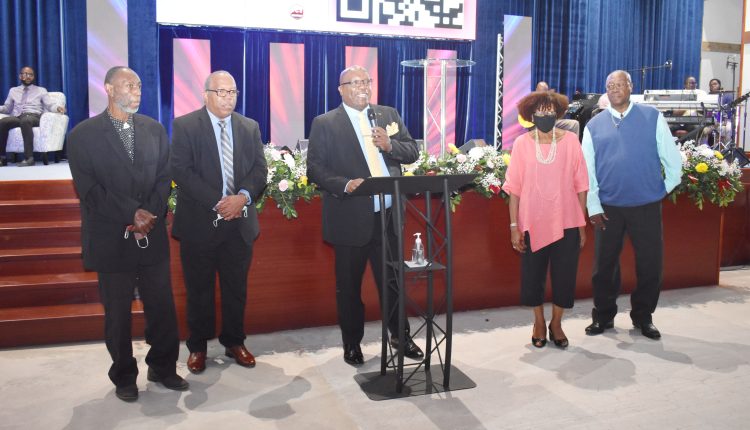 Prime Minister Harris (centre) introduces the ZBC team: From Left – Board Member Mr Leroy Willett, Chairman Mr Lester Hanley, Board Member Ms Elizabeth Tempro and General Manager Mr Viere Galloway.