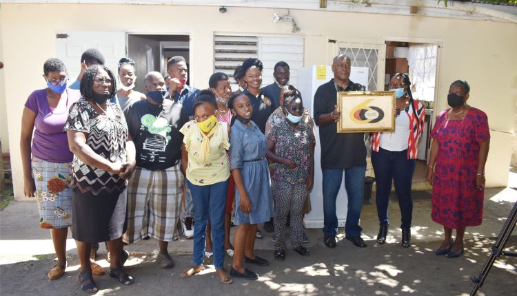 Board Members, Staff and trainees at Ade’s Place pose for a group picture with officials from ZIZ Broadcasting Corporation who presented them a 13 cubic feet refrigerator.