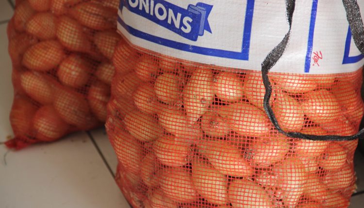 Locally grown onions in storage at the Department of Agriculture Marketing Unit will be among other local produce on sale at Agrofest at the Villa Grounds in Charlestown on March 26, 2021 (file photo)