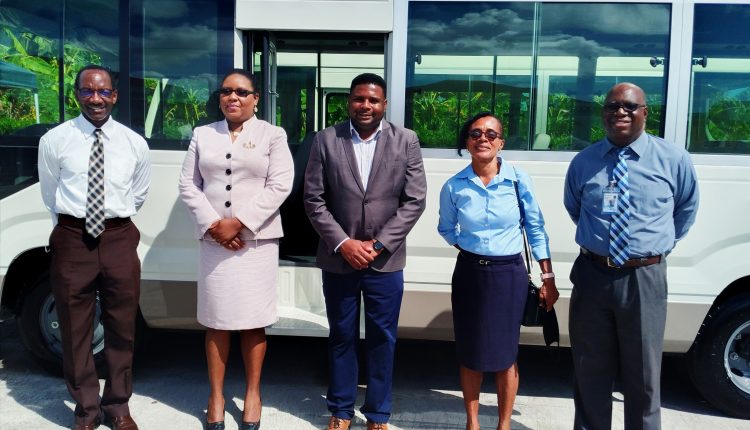 (l-r): Mr. Kevin Barrett, Permanent Secretary in the Ministry of Education; Ms. Zahnela Claxton, Principal Education Officer; Hon. Troy Liburd, Junior Minister of Education in the Nevis Island Administration; Mrs. Lineth Williams, Principal of the Gingerland Secondary School, Mr. Juan Williams, Principal of the Charlestown Secondary School at a handing over ceremony for two new school buses to the Ministry of Education in Nevis on March 09, 2021